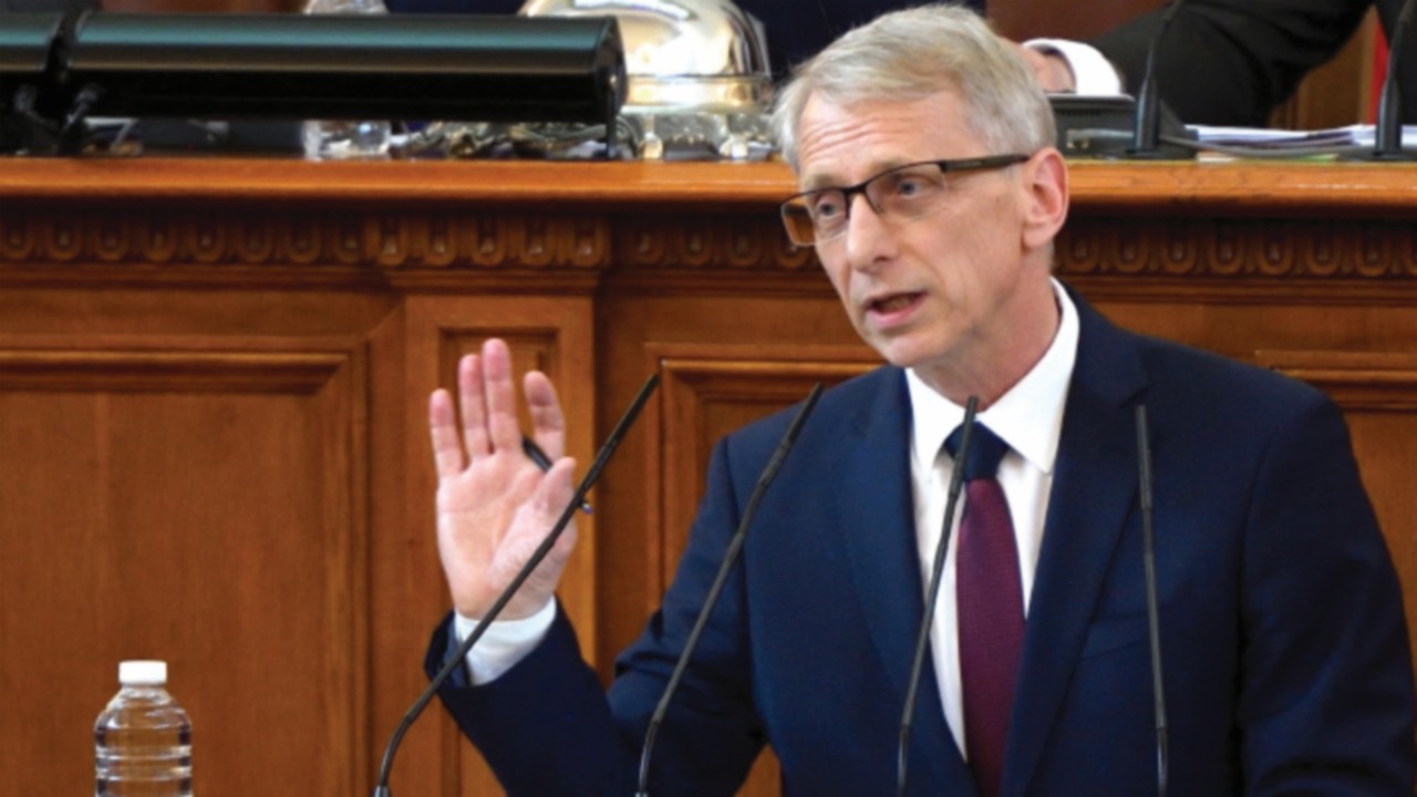 epa10675921 The new Prime Minister Nikolay Denkov speaks after taking the oath at the Parliament in ...