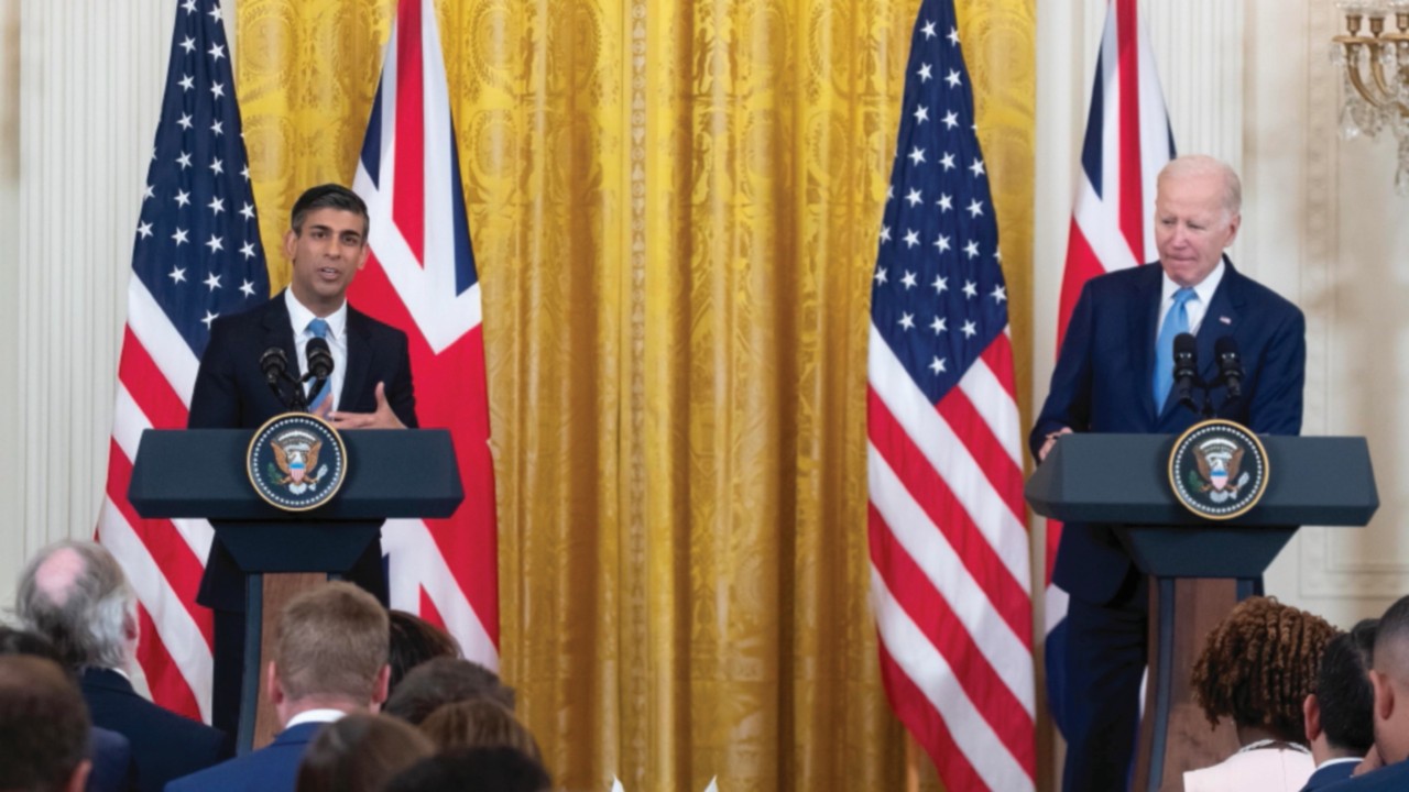 epa10680400 British Prime Minister Rishi Sunak (L) and US President Joe Biden (R) hold a news ...