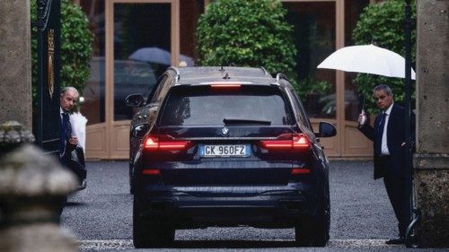 Cars arrive at Villa San Martino, the residence of former Italian Prime Minister Silvio Berlusconi, ...