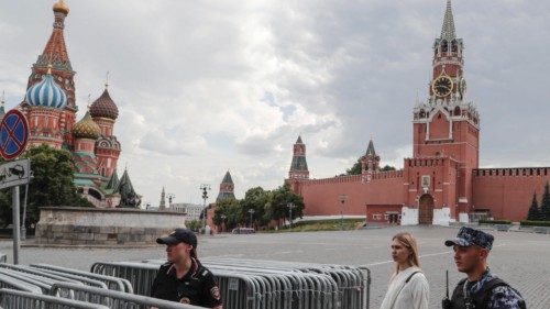epa10712148 Russian policemen guard a closed entrance to Red Square in Moscow, Russia, 26 June 2023. ...