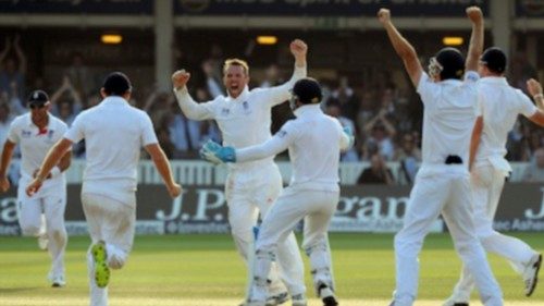 England's Graeme Swann celebrates taking the final Australian wicket to win the match on day four of ...
