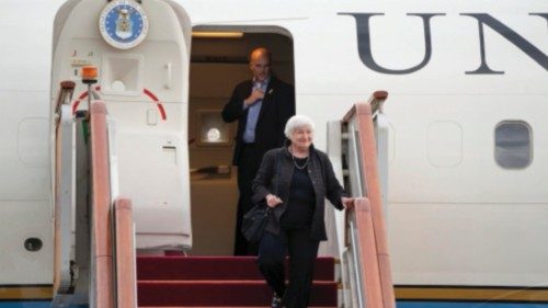 epa10729173 U.S. Treasury Secretary Janet Yellen (C) disembarks from a plane as she arrives at ...