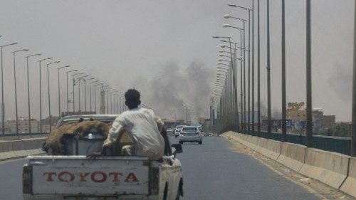 FILE PHOTO: Smoke rises in Omdurman, near Halfaya Bridge, during clashes between the Paramilitary ...
