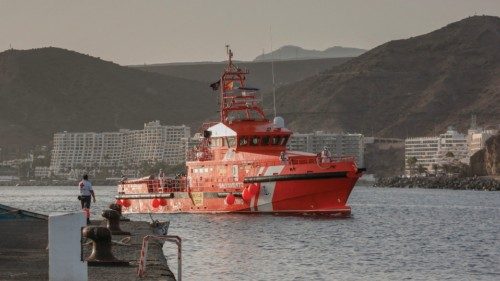 A Spanish Maritime Rescue vessel arrive after rescuing migrants at sea, in the Port of Arguineguin ...