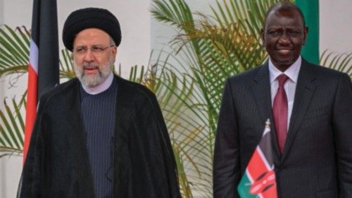 Iranian President Ebrahim Raisi (L) attends a press conference alongside Kenyan President William ...