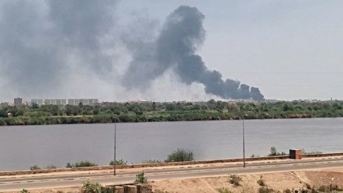 A picture taken from Omdurman shows smoke billowing in the distance in Khartoum North amid ongoing ...