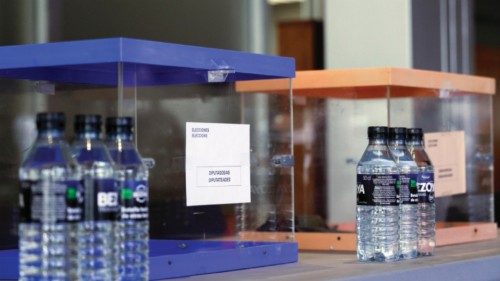 epa10760108 Ballot boxes are ready at a polling station ahead of the general elections in Barcelona, ...