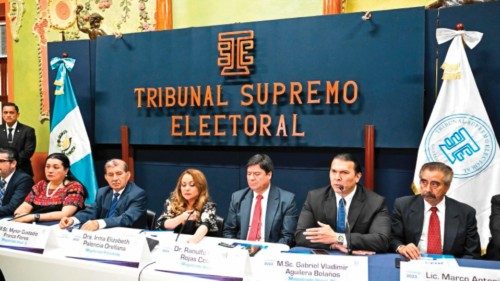 Magistrates of the Supreme Electoral Tribunal attend a press conference in which the results of the ...