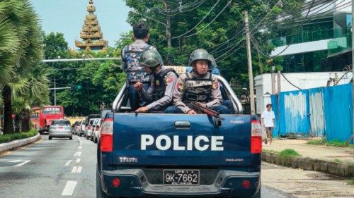 Police patrol on a street in Yangon on July 19, 2023, on the 76th Martyrs' Day, which marks the ...