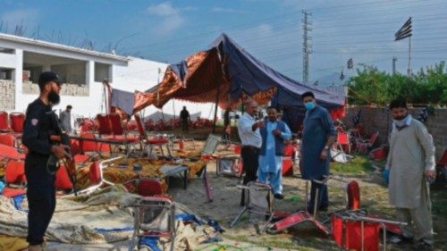 Security personnel examine the site of a bomb blast in Bajaur district of Khyber-Pakhtunkhwa ... Security personnel examine the site of a bomb blast in Bajaur district of Khyber-Pakhtunkhwa ...