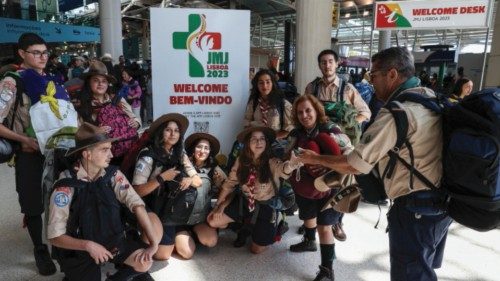epa10777375 Pilgrims from all over the world arrive at Lisbon Airport to participate in the World ...