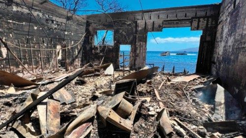 TOPSHOT - Destroyed buildings and homes are pictured in the aftermath of a wildfire in Lahaina, ...