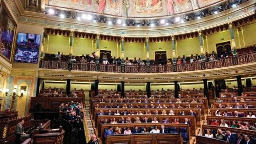 MPs attend the Parliament's constitutive sitting at the Congress of Deputies in Madrid on August 17, ...
