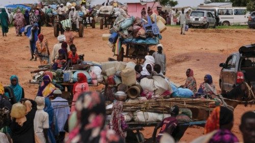 FILE PHOTO: Chadian cart owners transport belongings of Sudanese people who fled the conflict in ... FILE PHOTO: Chadian cart owners transport belongings of Sudanese people who fled the conflict in ...