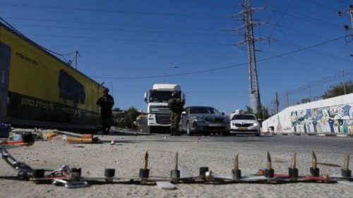 Israeli soldiers search a Palestinian's car at a checkpoint in Hebron in the Israeli-occupied West ... Israeli soldiers search a Palestinian's car at a checkpoint in Hebron in the Israeli-occupied West ...