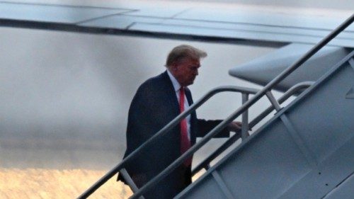 TOPSHOT - Former US President Donald Trump boards his plane as he departs Atlanta Hartsfield-Jackson ...