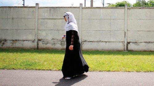 (FILES) A Muslim woman walks on June 19, 2016 in Mantes-la-Jolie. French authorities are to ban the ...