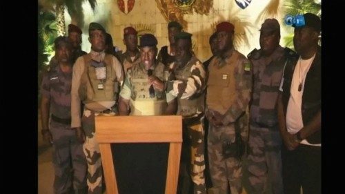 Gabonese military appear on television as they announce that they have seized power following ...