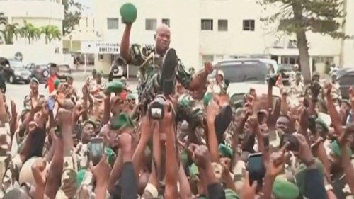 This video grab taken from Gabon 24 shows Gabonese soldiers carrying General Brice Oligui Nguema ...