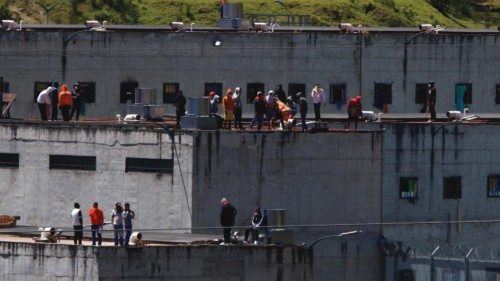 epa10829698 Prisoners on the roofs of El Turi prison, in the city of Cuenca, Ecuador, 30 August ...