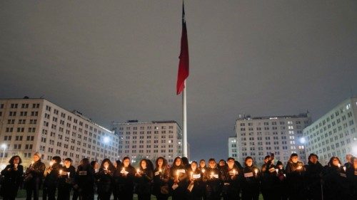 epa10853940 Women participate in a vigil for the anniversary of the coup d'état, in Santiago, Chile, ...