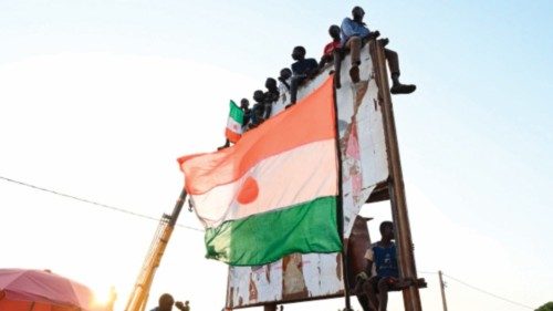 Supporters of Niger's National Concil for Safeguard of the Homeland (CNSP) attend the army support ...