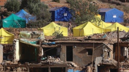 epa10861496 Destroyed houses and a makeshift camp in the aftermath of a powerful earthquake in the ... epa10861496 Destroyed houses and a makeshift camp in the aftermath of a powerful earthquake in the ...