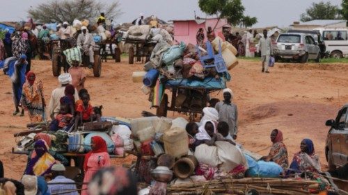 FILE PHOTO: Chadian cart owners transport belongings of Sudanese people who fled the conflict in ... FILE PHOTO: Chadian cart owners transport belongings of Sudanese people who fled the conflict in ...