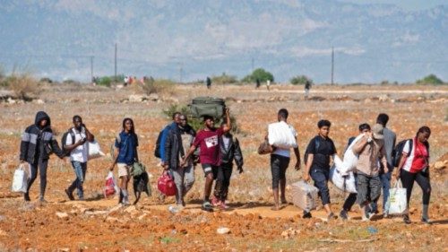 Migrants leave the Pournara camp, the main reception centre for migrants in Cyprus, after reported ...