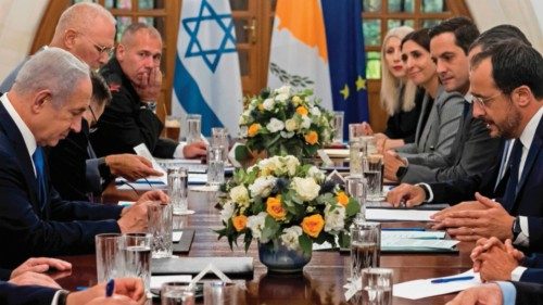 Cypriot President Nikos Christodoulides (R) meets with Israeli Prime Minister Benjamin Netanyahu ...