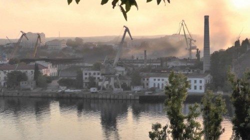 Smoke rises from the shipyard that was reportedly hit by Ukrainian missile attack in Sevastopol, ...