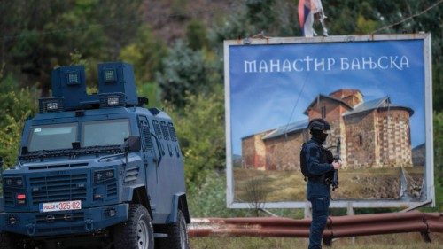 Kosovo police officers stand guard around the entrance to the village of Banjska, northern Kosovo on ...