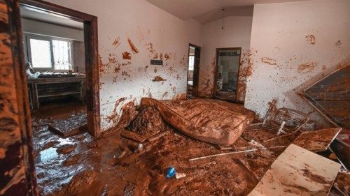 Mud and debris cover a living room in a house in the eastern city of Soussa on September 21, 2023, ...