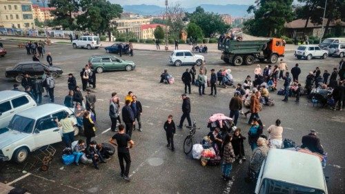Ethnic Armenians wait to be evacuated from Stepanakert on September 26, 2023. Armenia on September ...