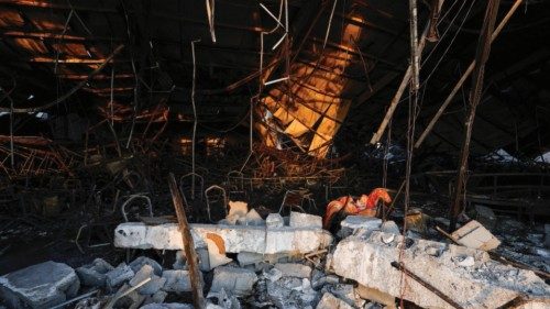 A view of the damage at the site following a fatal fire at a wedding celebration, in the district of ...