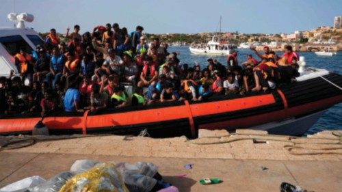 (FILES) In this file picture migrants arrive in the harbour of Italian island of Lampedusa, on ...