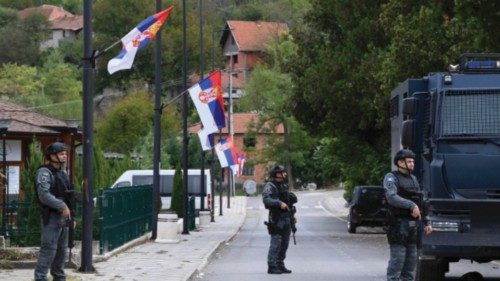 epa10885784 Armed Kosovo Police officers stand guard in the village of Banjska, Kosovo, 27 September ...