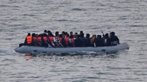 A group of migrants on an inflatable dinghy is seen from the French rescue vessel 'Abeille ...