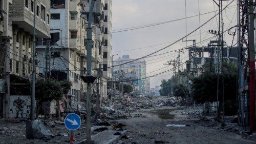 epa10918253 An area with heavily damaged and destroyed buildings is deserted after residents of Gaza ...
