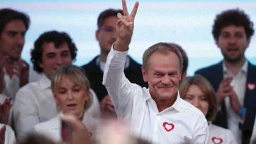 Donald Tusk, leader of the largest opposition grouping Civic Coalition (KO), gestures after the exit ...