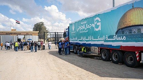epa10925605 A truck of a humanitarian aid convoy for the Gaza Strip is parked outside Rafah border ...