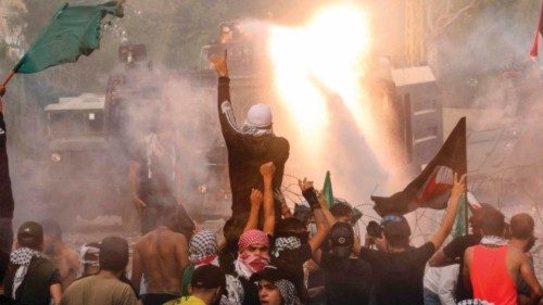 Lebanese security forces use water cannons as they clash with protesters outside the US Embassy in ...
