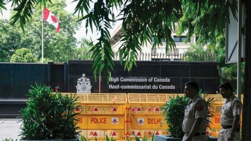 (FILES) Security personnel stand guard in front of the High Commission of Canada in New Delhi on ...