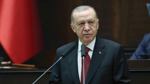 FILE PHOTO: Turkey's President Tayyip Erdogan addresses lawmakers from his ruling AK Party at the ...