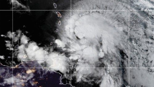 FILE PHOTO: FILE PHOTO: A satellite image shows Hurricane Elsa over the Lesser Antilles and ...
