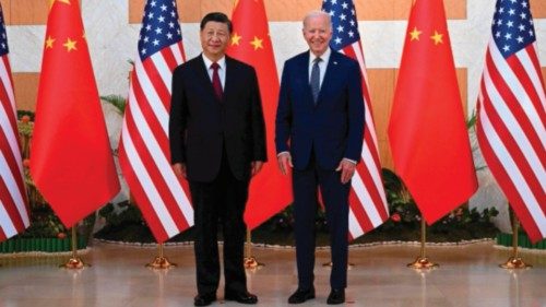 (FILES) US President Joe Biden (R) and China's President Xi Jinping (L) meet on the sidelines of the ...