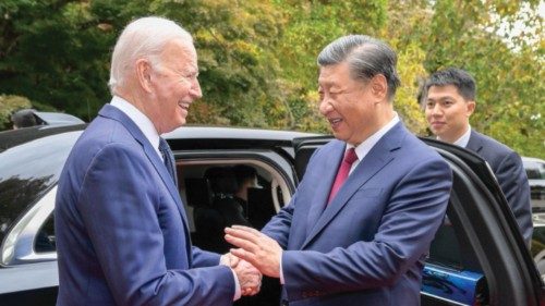 epa10977855 US President Joe Biden (L) escorts Chinese President Xi Jinping to his car to bid ...