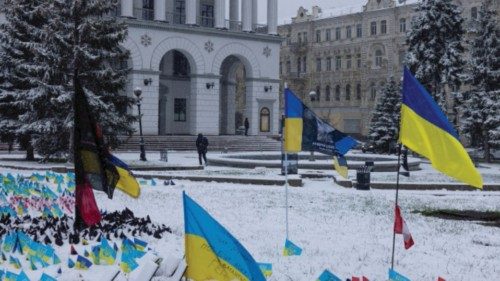 A man walks near a memorial site for servicemen who lost their lives fighting against the Russian ... A man walks near a memorial site for servicemen who lost their lives fighting against the Russian ...