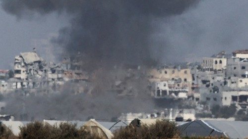 Smoke rises following an Israeli airstrike in central Gaza, amid the ongoing conflict between Israel ...