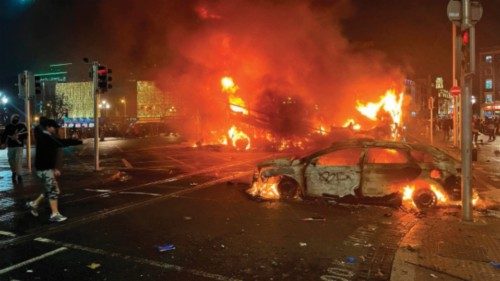 TOPSHOT - Flames rise from the car and a bus, set alight at the junction of Bachelors Walk and the ... TOPSHOT - Flames rise from the car and a bus, set alight at the junction of Bachelors Walk and the ...